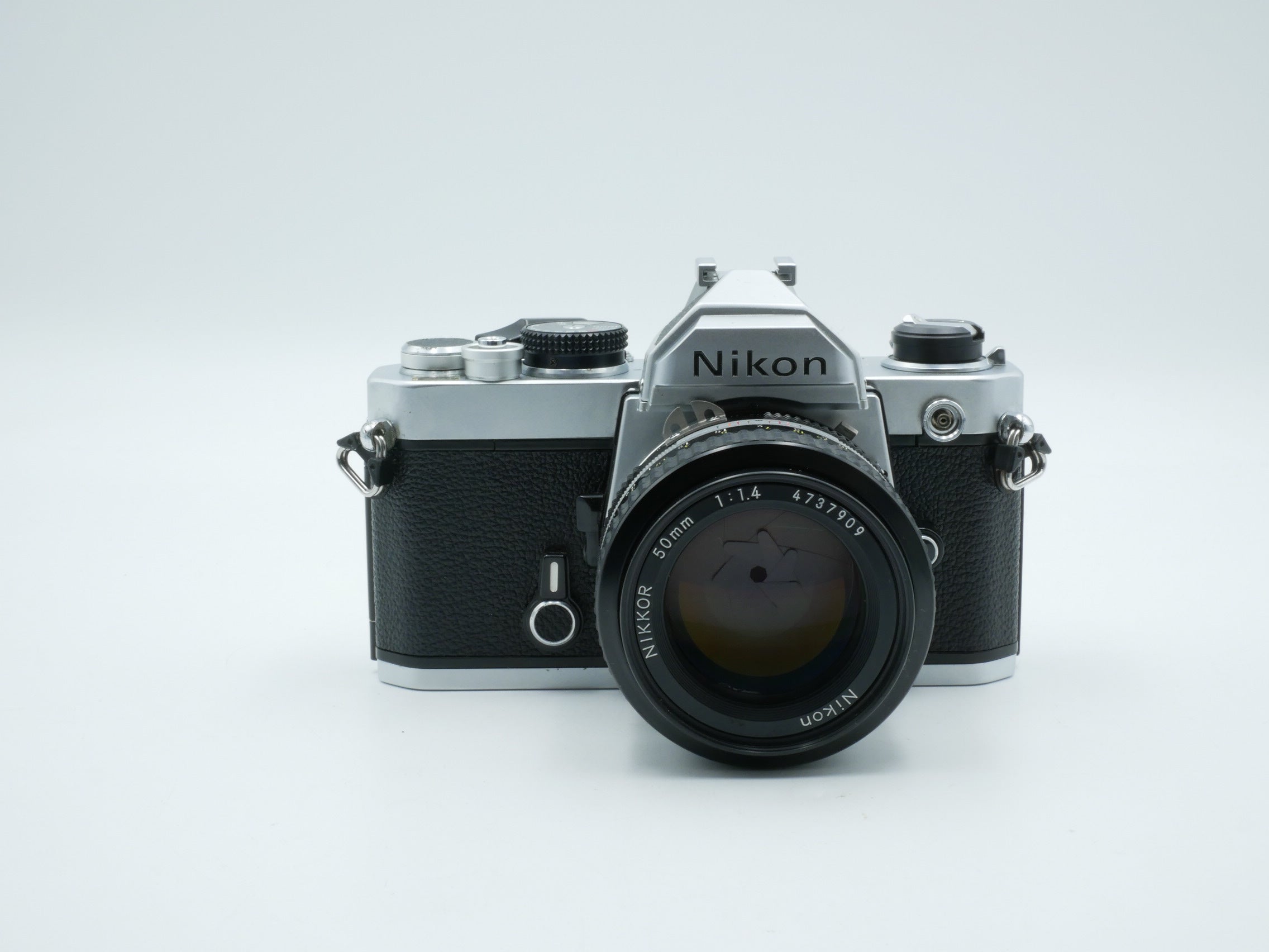 Used Nikon FM Film SLR with 50mm f/1.4 Lens (#3250937WW+4737909WW)